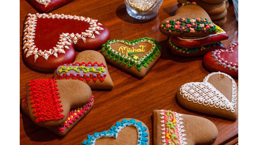 Festively-decorated heart shaped gingerbread cookies