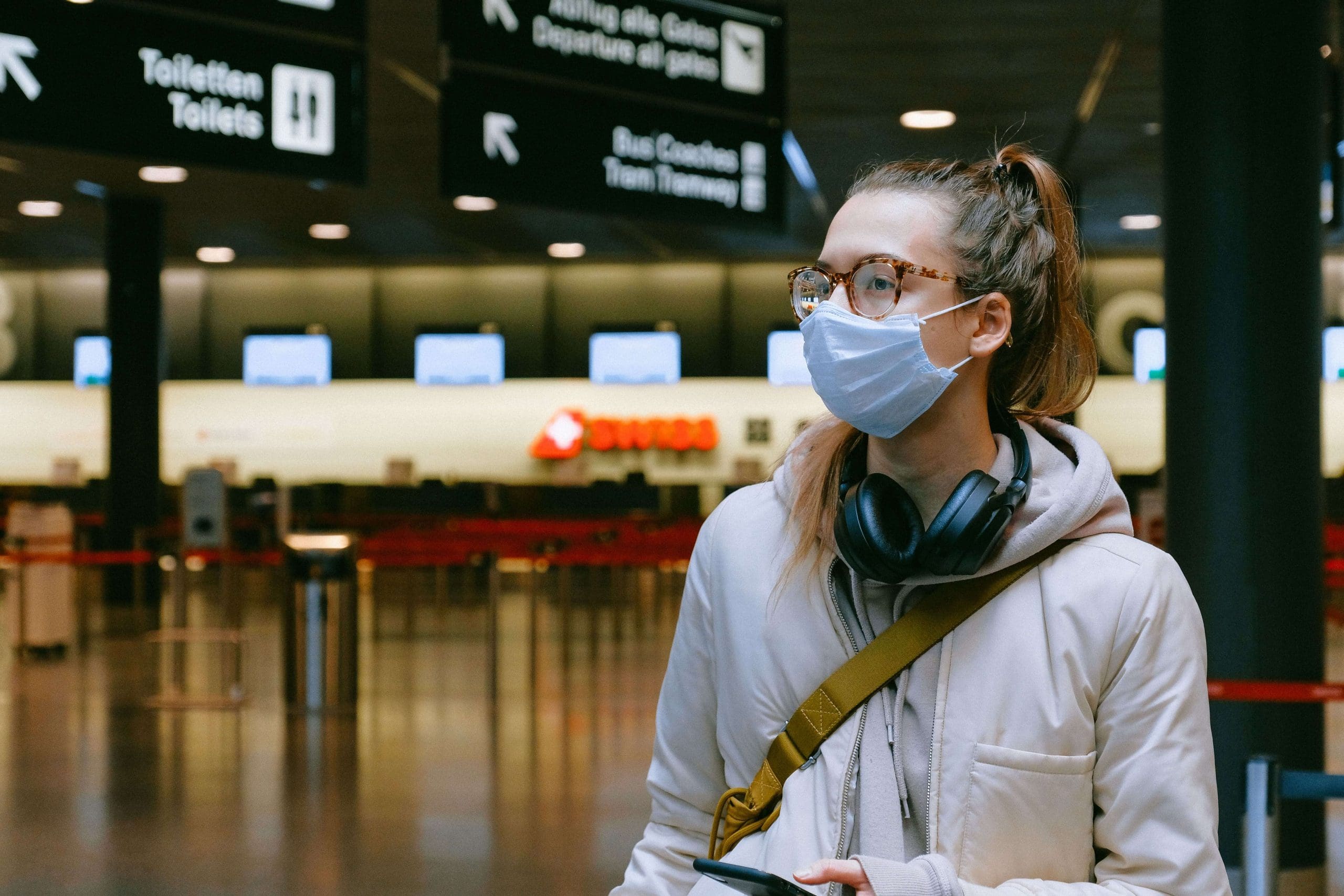 Young woman wearing a PPE mask