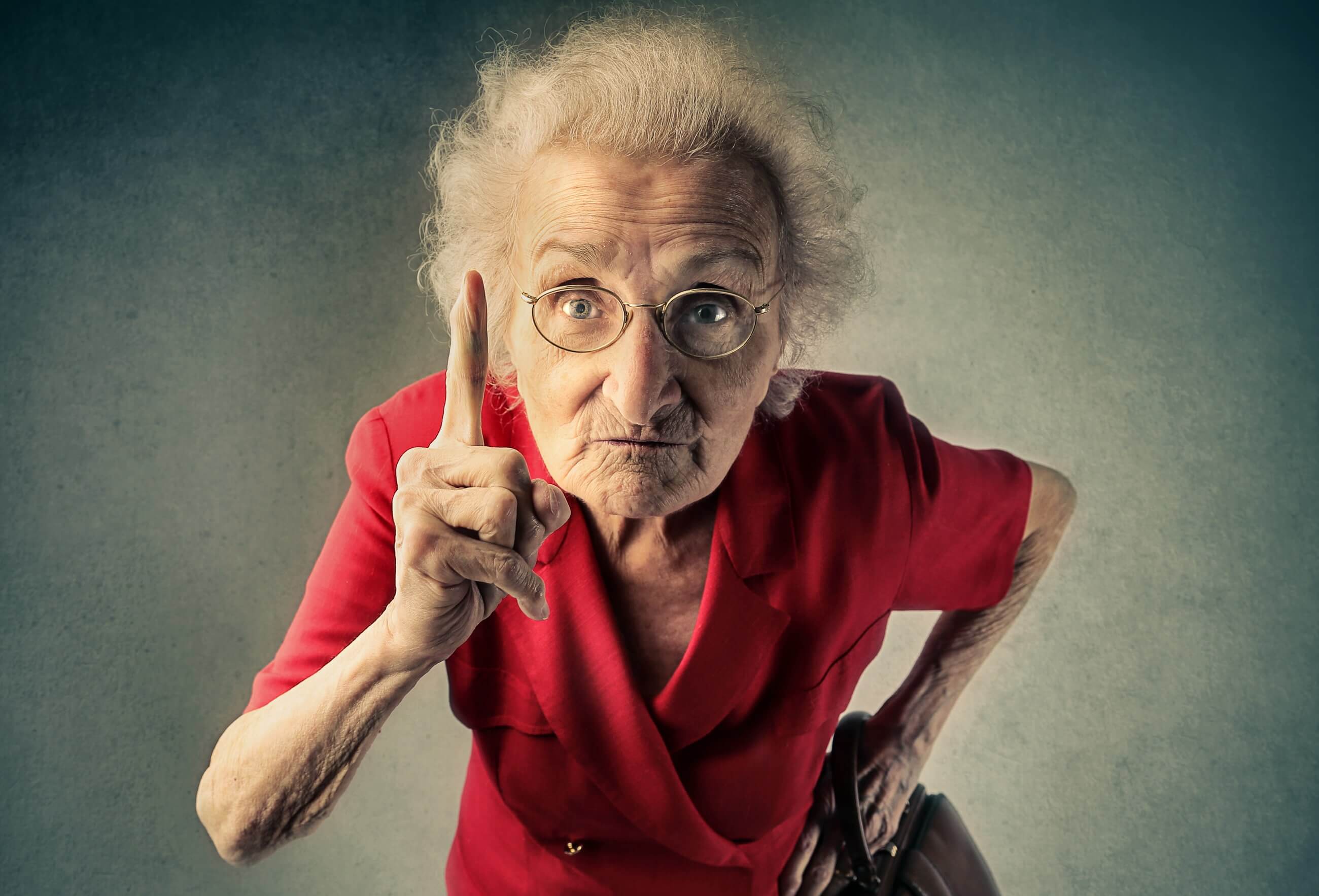 Elderly woman telling someone off