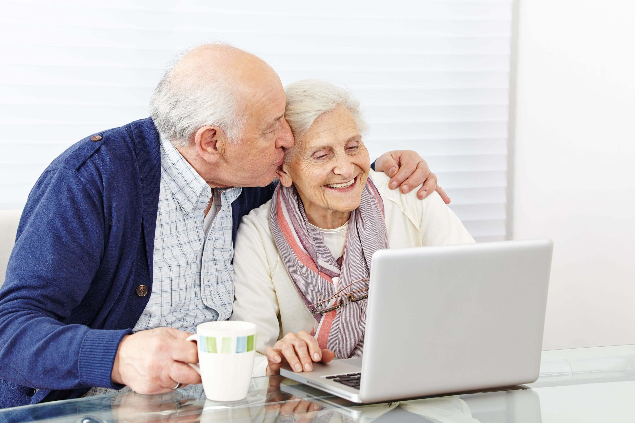 Senior couple using a laptop computer