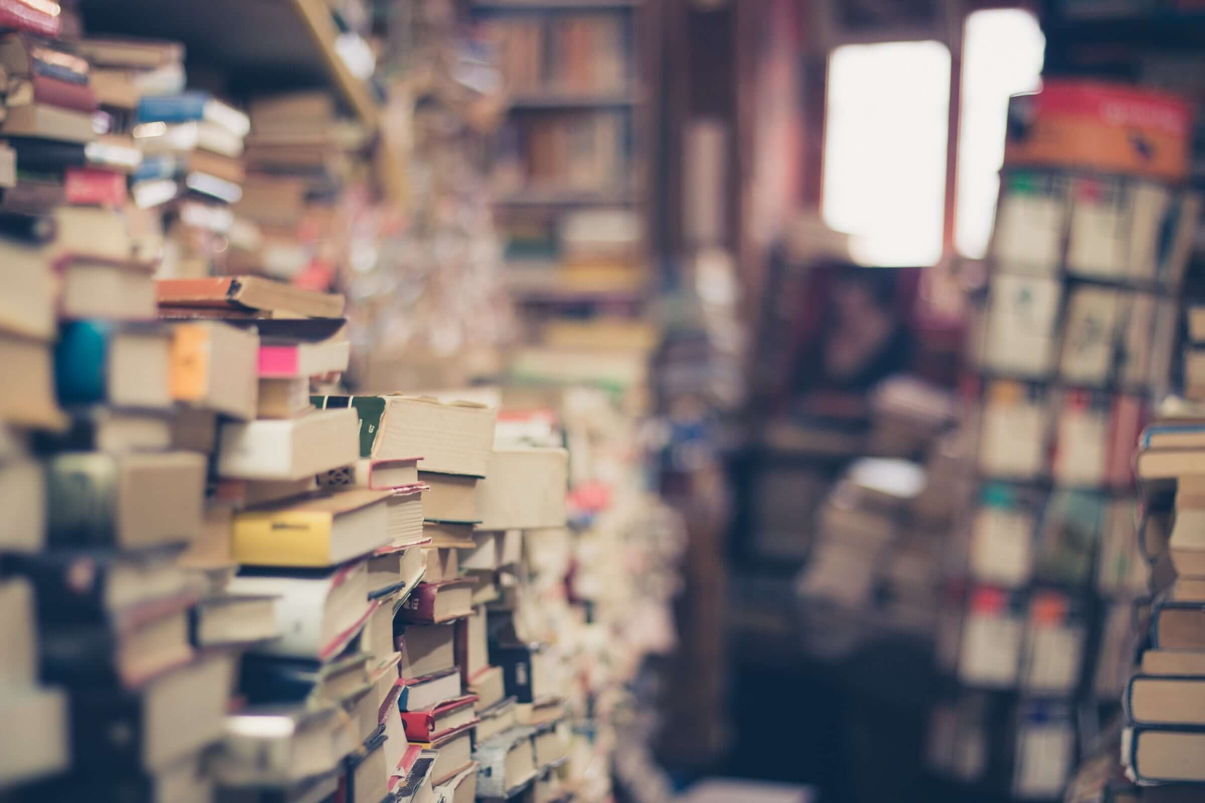 Hoarded stacks of books in a room